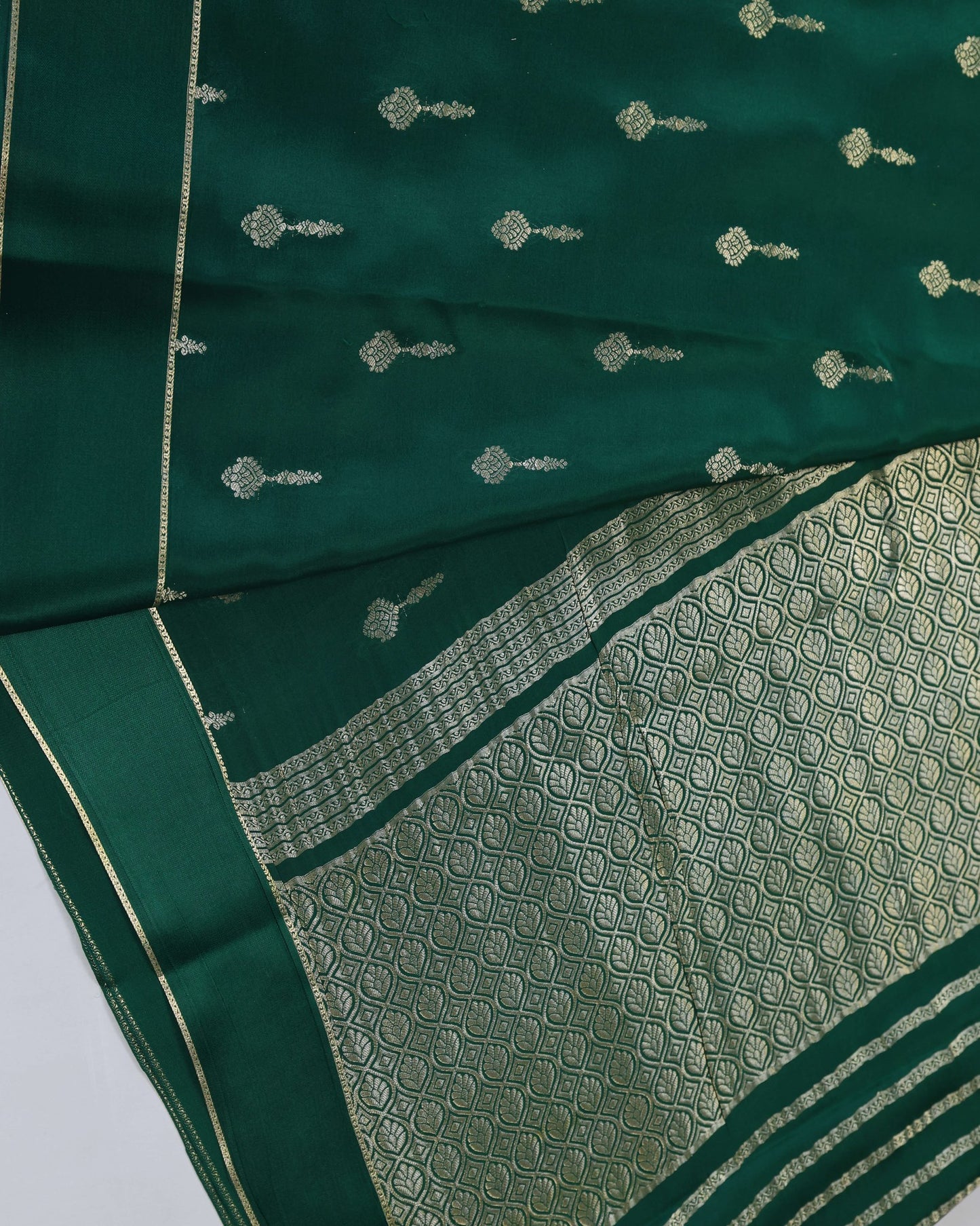 Bottle green gap boder wlth butta pure mysore silk