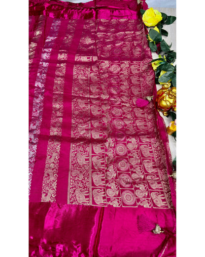 Pink saree with gold and silver butta