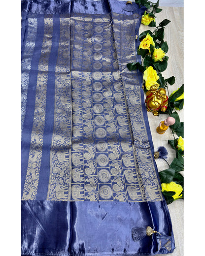 Pastal light blue premium saree with gold and silver butta