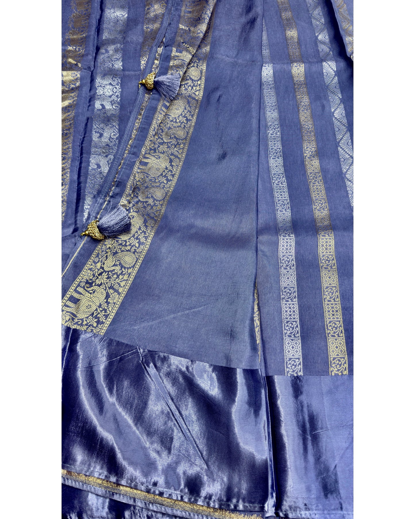 Pastal light blue premium saree with gold and silver butta
