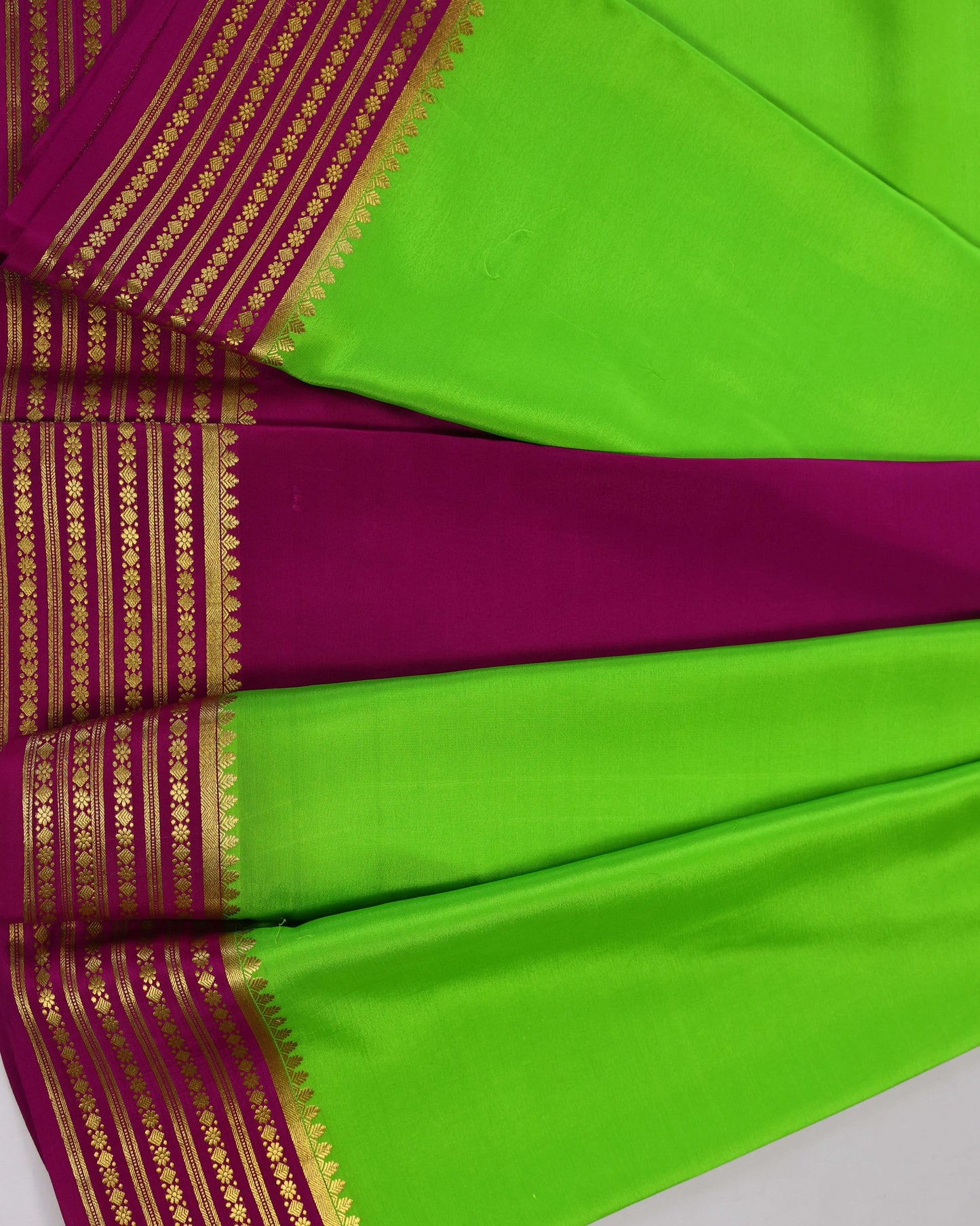 parrot green with rani pink gatti boder pure mysore silk
